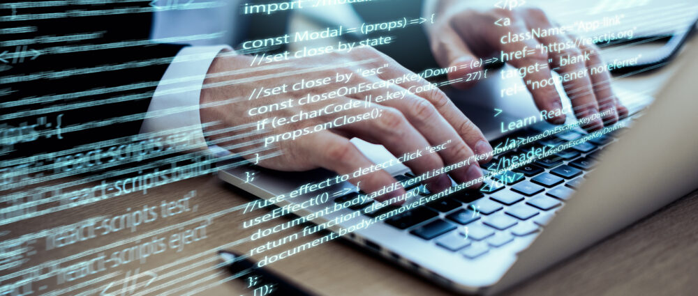 programming-background-with-person-working-with-codes-computer (1) Software Engineering Services